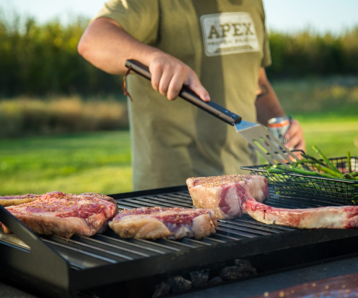 Meat being seasoned